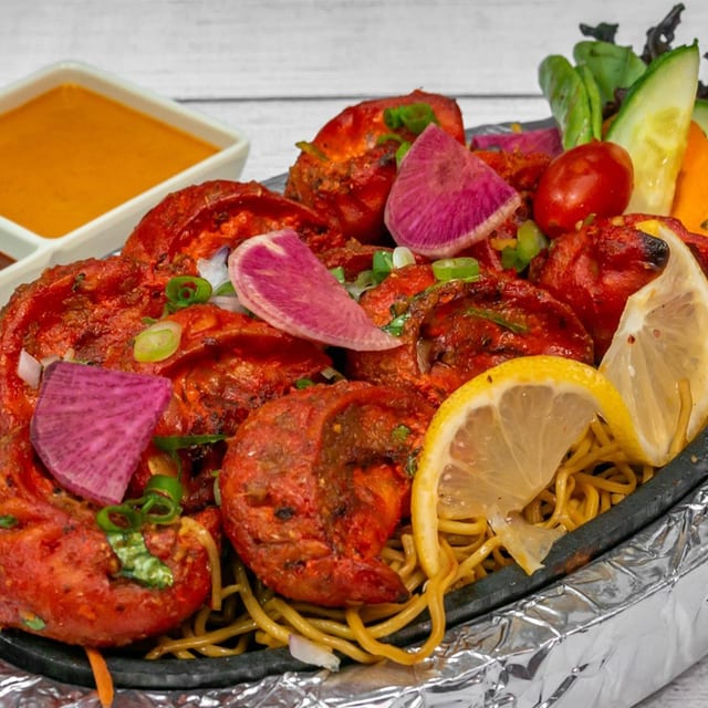 Tandoori Momo - Chicken with Chowmein.